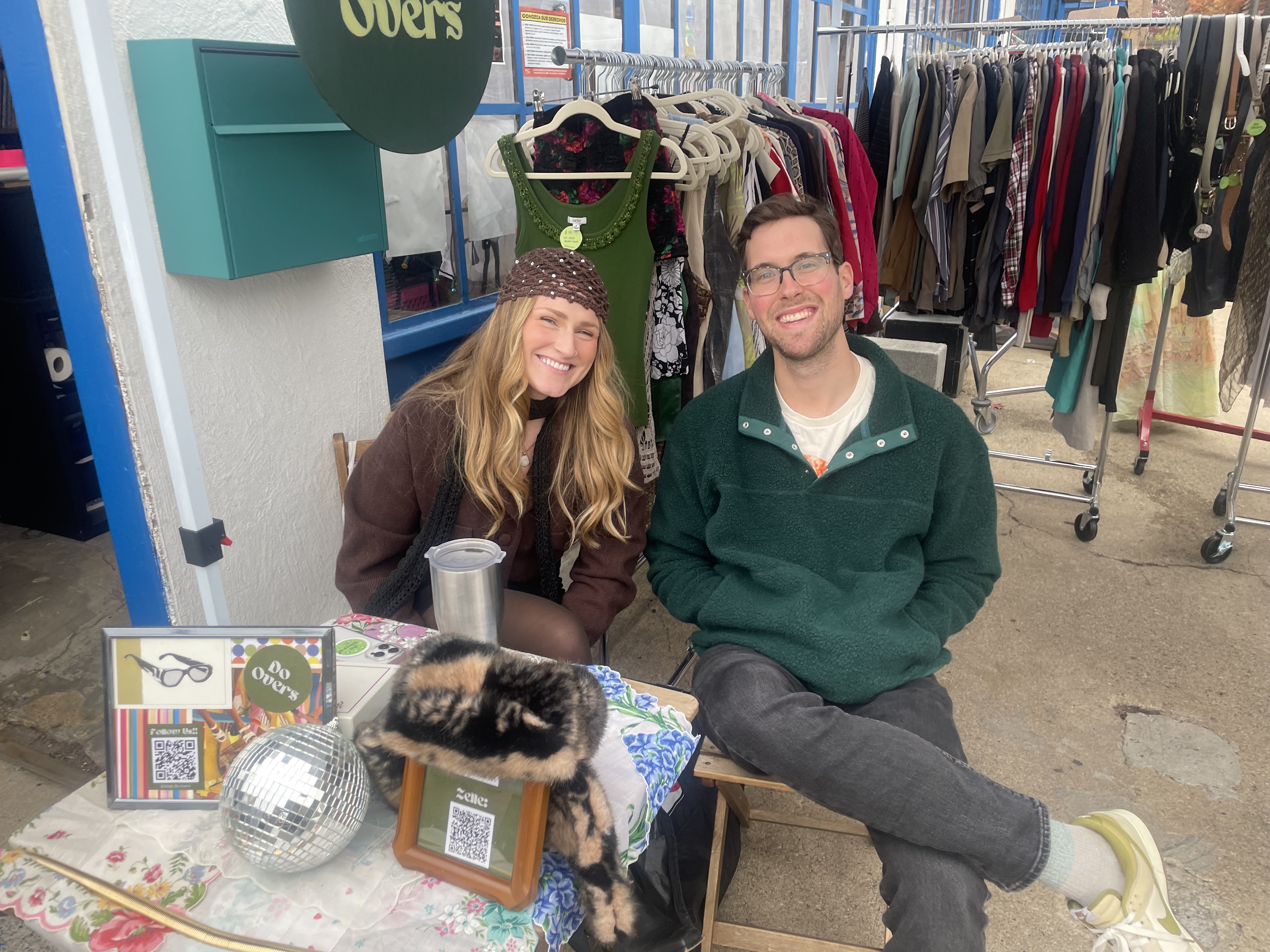 Friends browsing vinyl crates at the market