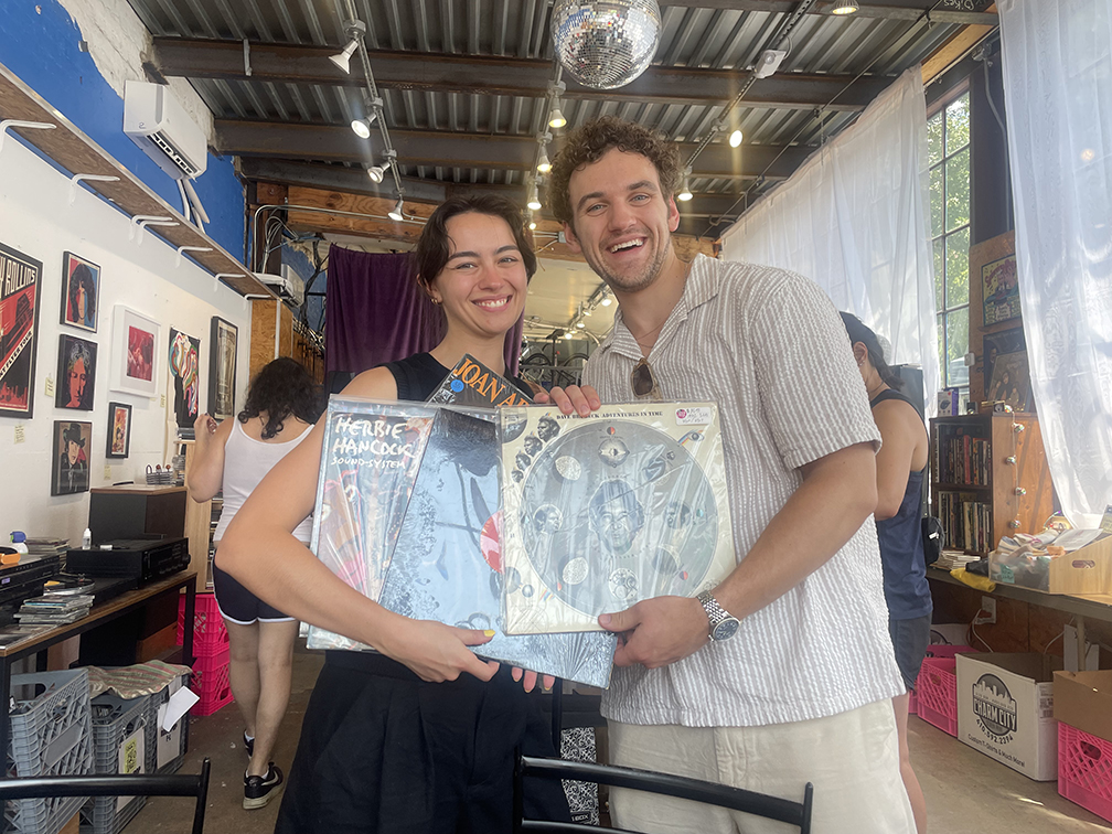Customers enjoying vinyl shop 1