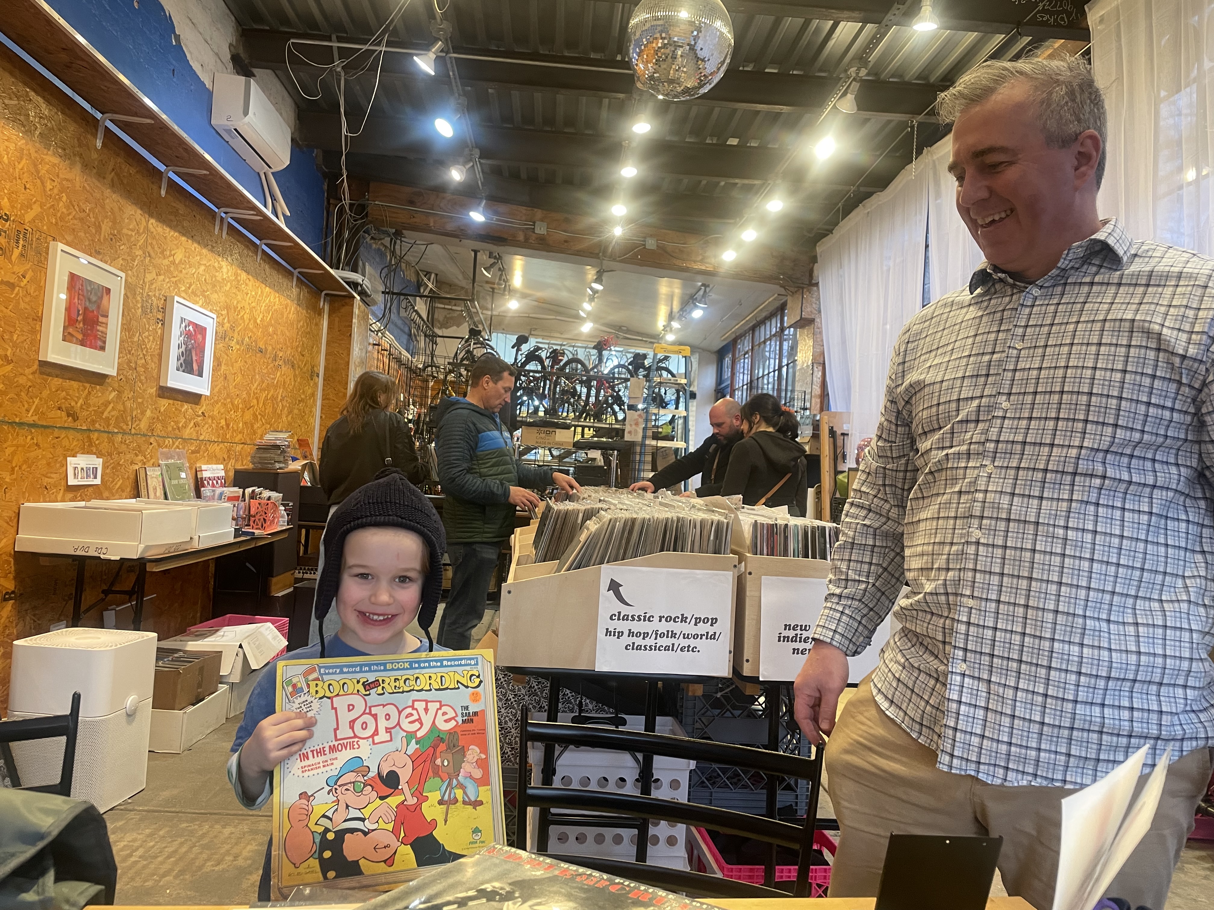 Customers enjoying vinyl shop 2
